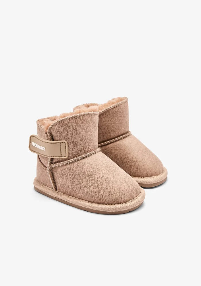 STIVALETTO AUSTRALIANO CON CHIUSURA A STRAPPO E FODERA IN PELLICCIA
