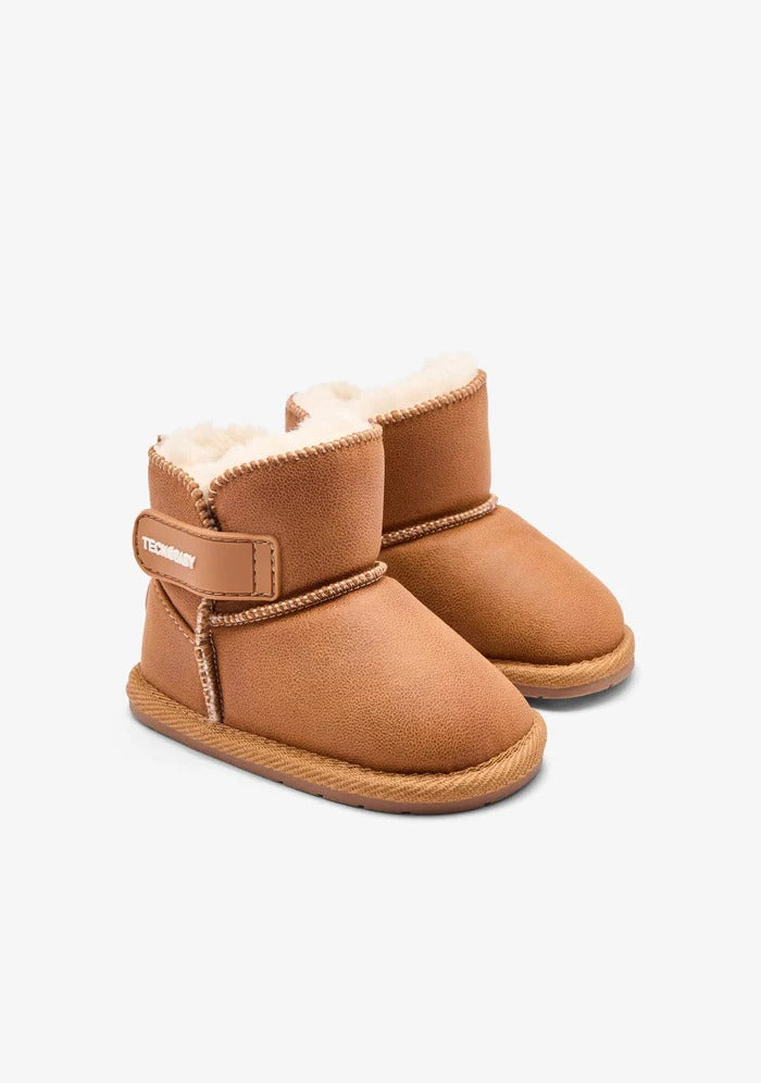 STIVALETTO AUSTRALIANO CON CHIUSURA A STRAPPO E FODERA IN PELLICCIA