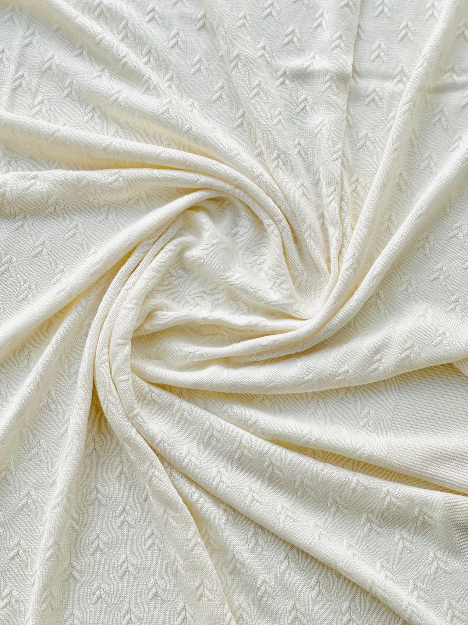 COPERTINA IN MAGLIA TRAFORATA