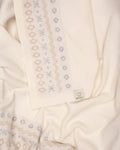 COPERTA JAQUARD IN PURA LANA LATTE