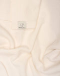 COPERTA BASIC LATTE IN PURA LANA